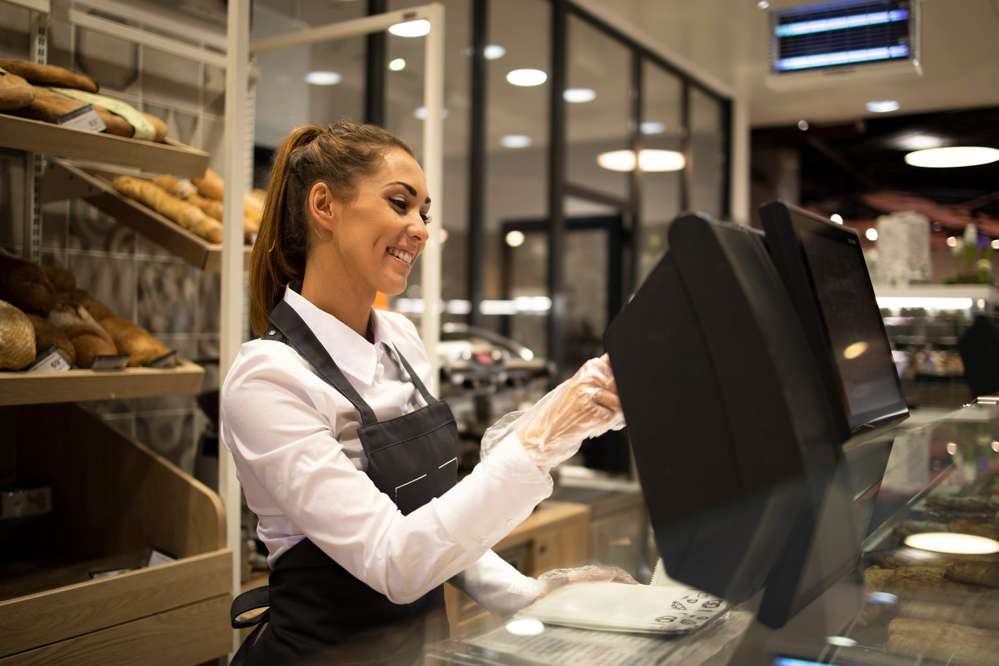 Female Baker Seller Working Computer Selling Bread Supermarket